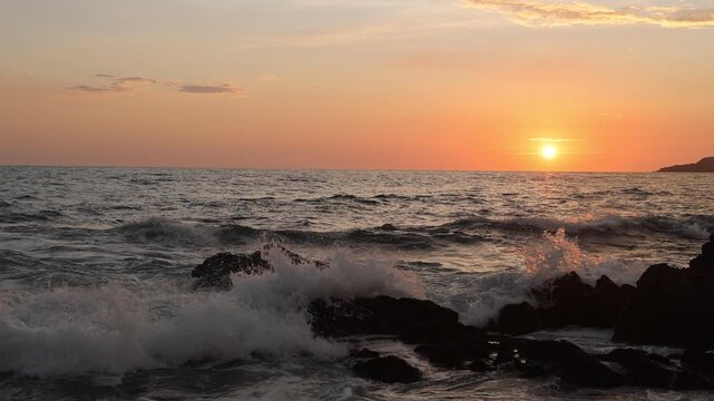 Mazatlan beaches, sunsets and scenic slow motion ocean swells and waves near Malecon sea promenade