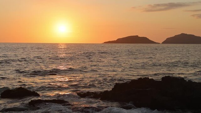 Mazatlan beaches, sunsets and scenic slow motion ocean swells and waves near Malecon sea promenade