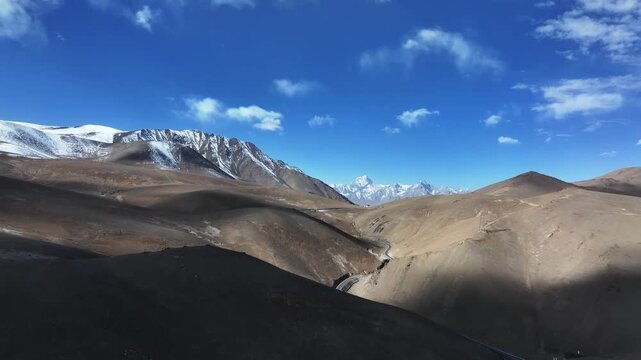 panlong ancient road winding through desert valley in xinjiang