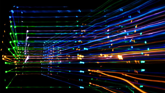 Colorful abstract particle trails in dark space background with glowing lines illustration