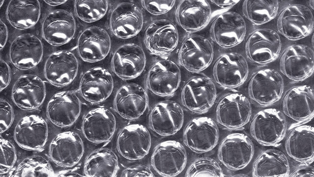 Bubble wrap texture isolated on black background. Opacity or screen mode usage for overlay