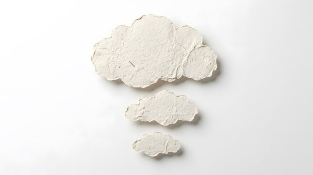 Three handmade paper clouds isolated on white background for creative design and weather concept art