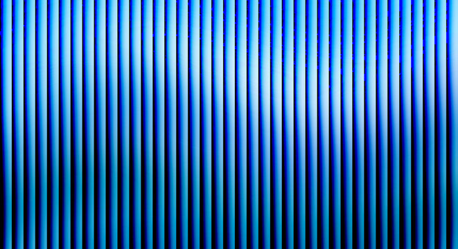 Vertical blue stripes with gradient lighting, abstract background