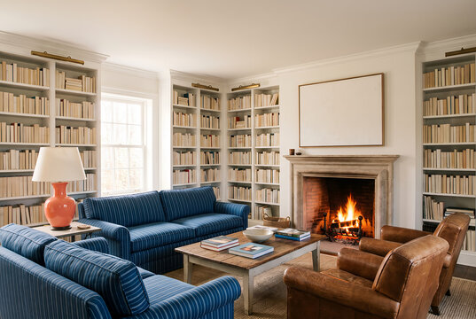 Traditional living room with built-in bookshelves and fireplace