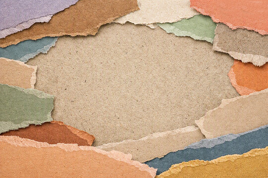 Colorful Torn Paper Edges Framing Textured Brown Kraft Paper Background