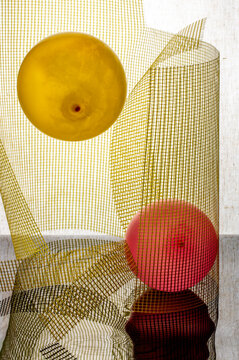 Yellow mesh with yellow and red balloons