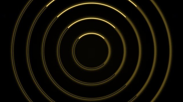 Golden glowing concentric circles pattern pulsing on black background