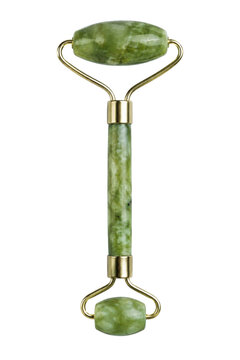 Beautiful green jade facial roller with golden metal accents, isolated vertically on a clean white background