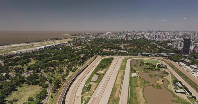 Buenos Aires Argentina Aerial v30 sweeping flyover along Hipodromo Argentino, Palermo parks and the city golf course toward Aeroparque - Shot with 5k Camera - Jan 2nd 2026