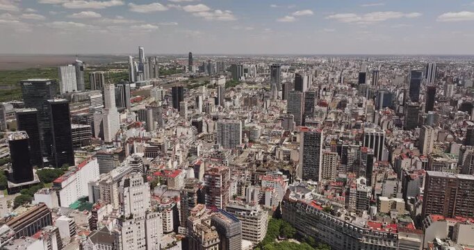 Buenos Aires Argentina Aerial v41 broad flyover across Retiro and San Nicolas dense downtown blocks toward Catalinas Norte towers and Avenida 9 de Julio - Shot with 5k Camera - Jan 3rd 2026