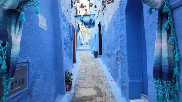 Morocco travel destination Chefchaouen iconic azure blue painted old town.