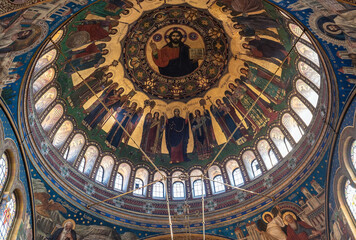 Ornate interior dome frescoes and chandelier in Orthodox Cathedral Sibiu © multipedia