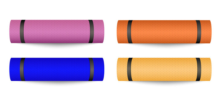 Set of four colorful rolled yoga mats with black carrying straps transparent background