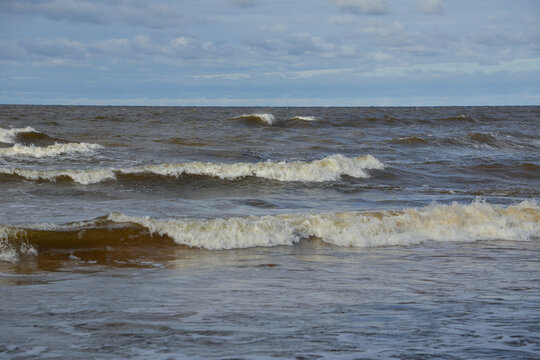 Rough Sea Waves Under a Cloudy Sky