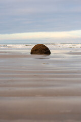 View of one rock at Moeraki Boulders Beach, New Zealand. © AlexandraDaryl
