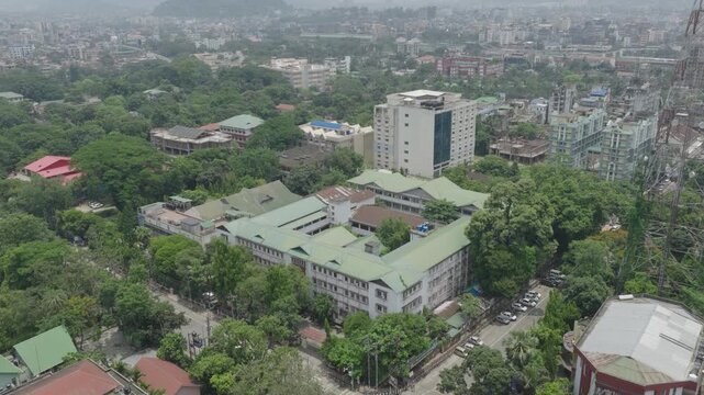 Aerial View of a Green Urban City with Buildings