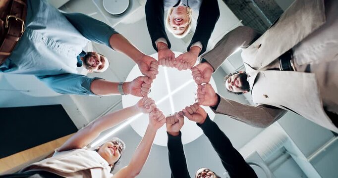 Circle, below and business people with fist bump in office for support, solidarity and workforce. Corporate, happy and workers huddle for collaboration, teamwork and connection for workplace synergy