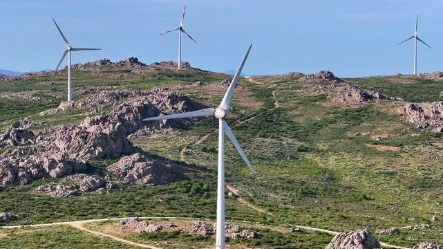 Aerial view of wind turbines on mountain landscape in Sardinia, Italy