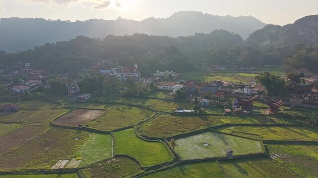 Aerial drone flying over rantepao rice paddies in sulawesi indonesia