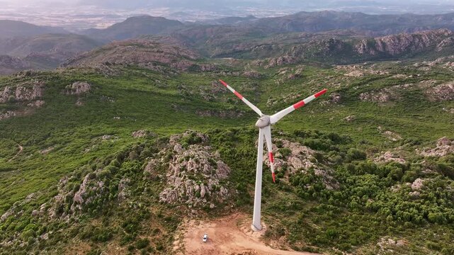 Aerial view of wind turbines on mountain landscape in Sardinia, Italy