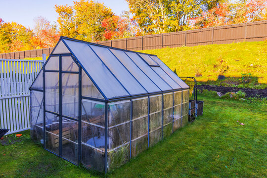 Close-up view of greenhouse used for winter storage of garden items in autumn. Sweden.