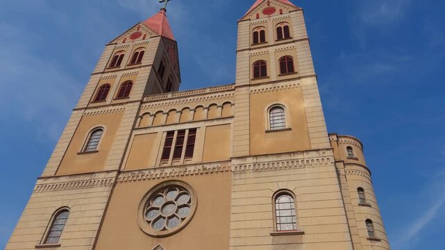Qingdao St Michael Cathedral Gothic Facade Handheld Slow Tilt Down