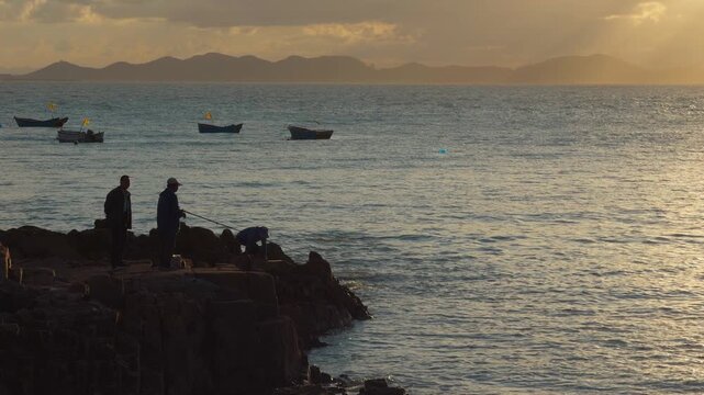 Qingdao Yellow Sea Fisherman Silhouette Fishing at Sunset Coastal Cinematic