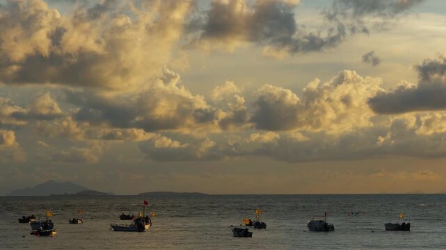 Sunset Sea with Boats Dramatic Sky Tyndall Effect Handheld