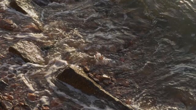 Ocean Waves Washing Over Coastal Rocks Close-Up Slow Motion