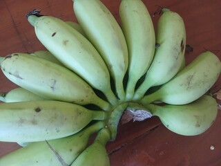 Close-up of a green banana © anjar_sasmiko