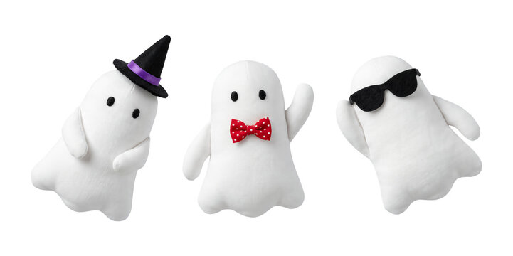 Three cute plush ghost dolls wearing witch hat, polka dot bowtie, and sunglasses isolated on transparent background, soft fabric Halloween toy mascot set