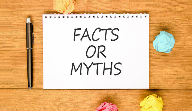 Facts or myths words symbol. Concept words Myths or Facts on beautiful white note. Beautiful wooden background. Colored paper. Business and facts or myths concept. Copy space.