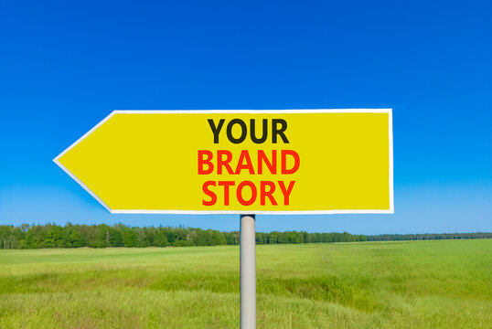 Branding and your brand story symbol. Concept words Your brand story on beautiful yellow road sign. Beautiful blue sky green grass background. Business branding your brand story concept. Copy space.