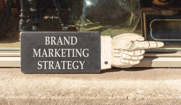 Brand marketing strategy words symbol. Concept words Brand marketing strategy on beautiful black information sign. Beautiful shopfront background. Business brand marketing strategy concept. Copy space