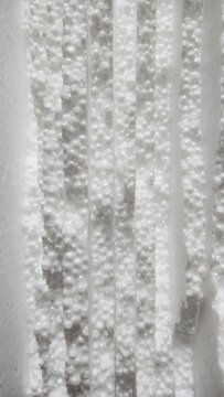 expanded foam insulation texture, white, fine-grained, expanded polystyrene, modern, packaging material, thermal insulation, construction material, background 7