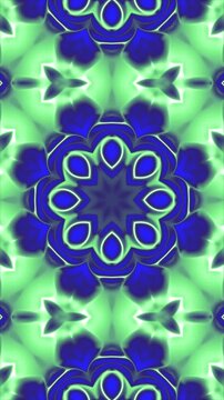 Vibrant abstract blue and green geometric kaleidoscope pattern with seamless symmetrical floral motifs.