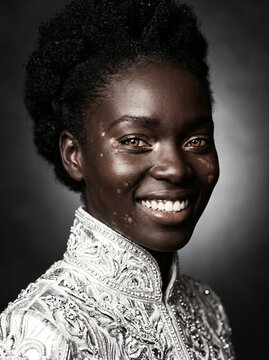 High-key portrait of a beautiful model&rsquo;s face, smiling