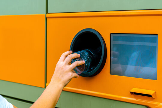 Bottle return station accepting recyclable plastic container.