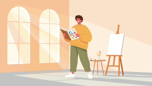 Aspiring artist looking at a sketchbook in a sunny art studio next to a blank white canvas on an easel.