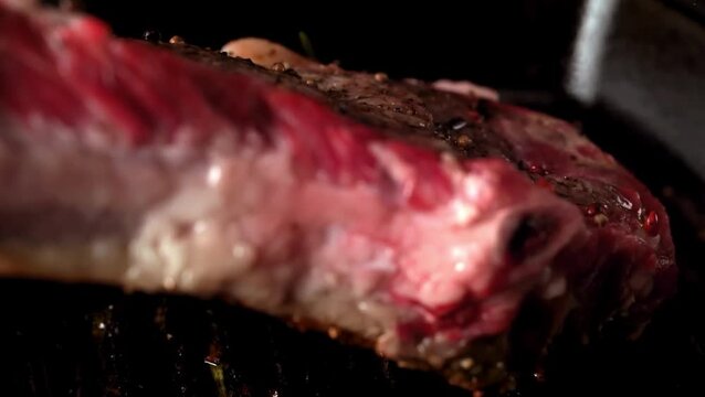 4K Video of fresh raw beef showing its natural marbling, rich red color, and detailed meat texture.
