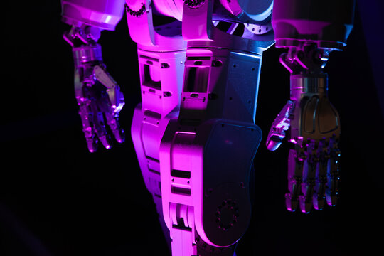 Robot arm against a dark background