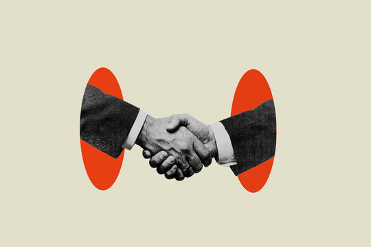 Businessmen shaking hands representing corporate partnership and agreement against red shapes background