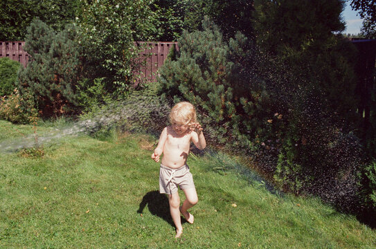 A little boy is happy about the summer activities