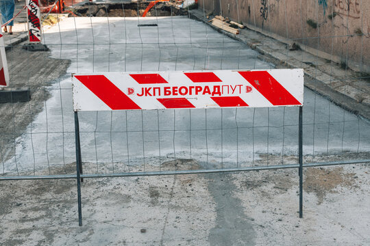 August 30, 2026, Belgrade, Serbia: JKP Beograd Put barrier sign blocking a freshly paved road repair site