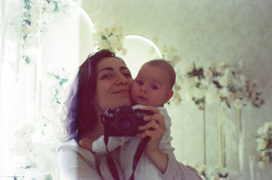 Mother And Son Framed In Florals