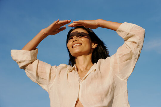 Joyful Moments Under the Bright Blue Sky at the Beach