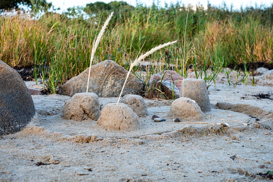 Sandburg im Sand am Strand
