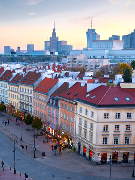 2025-10-23;  Warsaw cityscape with historic houses and modern skyscrapers at sunset. Poland