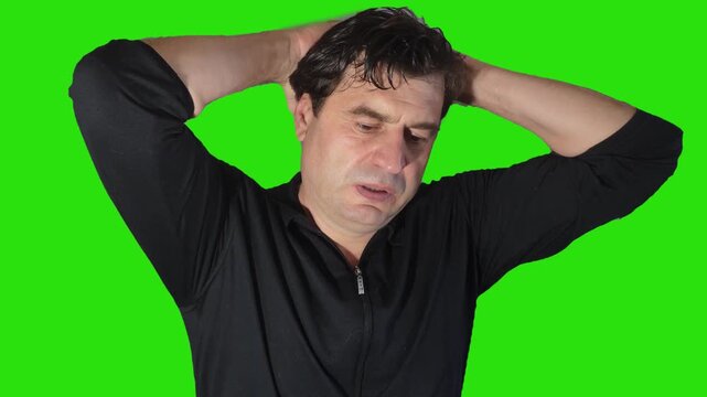 The man experiences stress. Thoughtfully, concentratedly, he tries to find the right solution.
