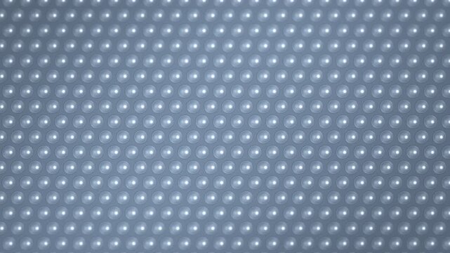 Glossy bubble wrap macro with sliding reflections, 4K seamless loop